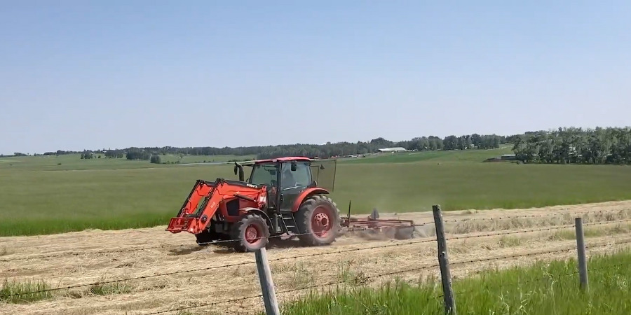 tractor in forage field